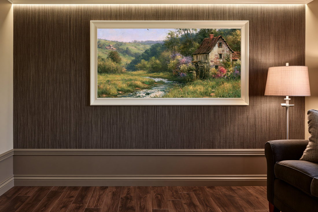 Wide framed print lit on a warm wood-panelled wall